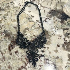 Unique matte black filigree V shaped necklace